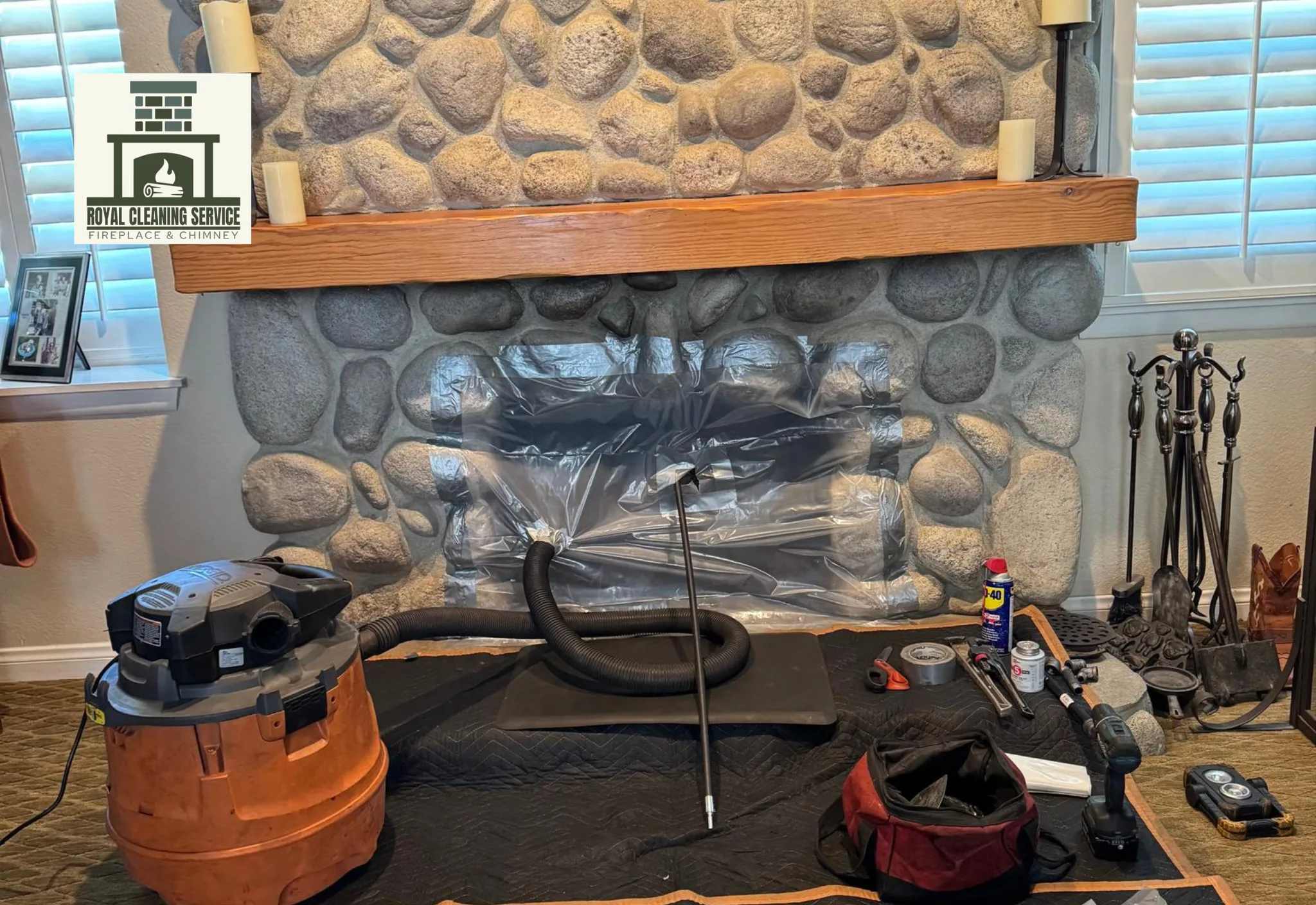 Royal Cleaning Service professional performing a chimney sweep in Los Angeles, removing creosote and soot from the flue