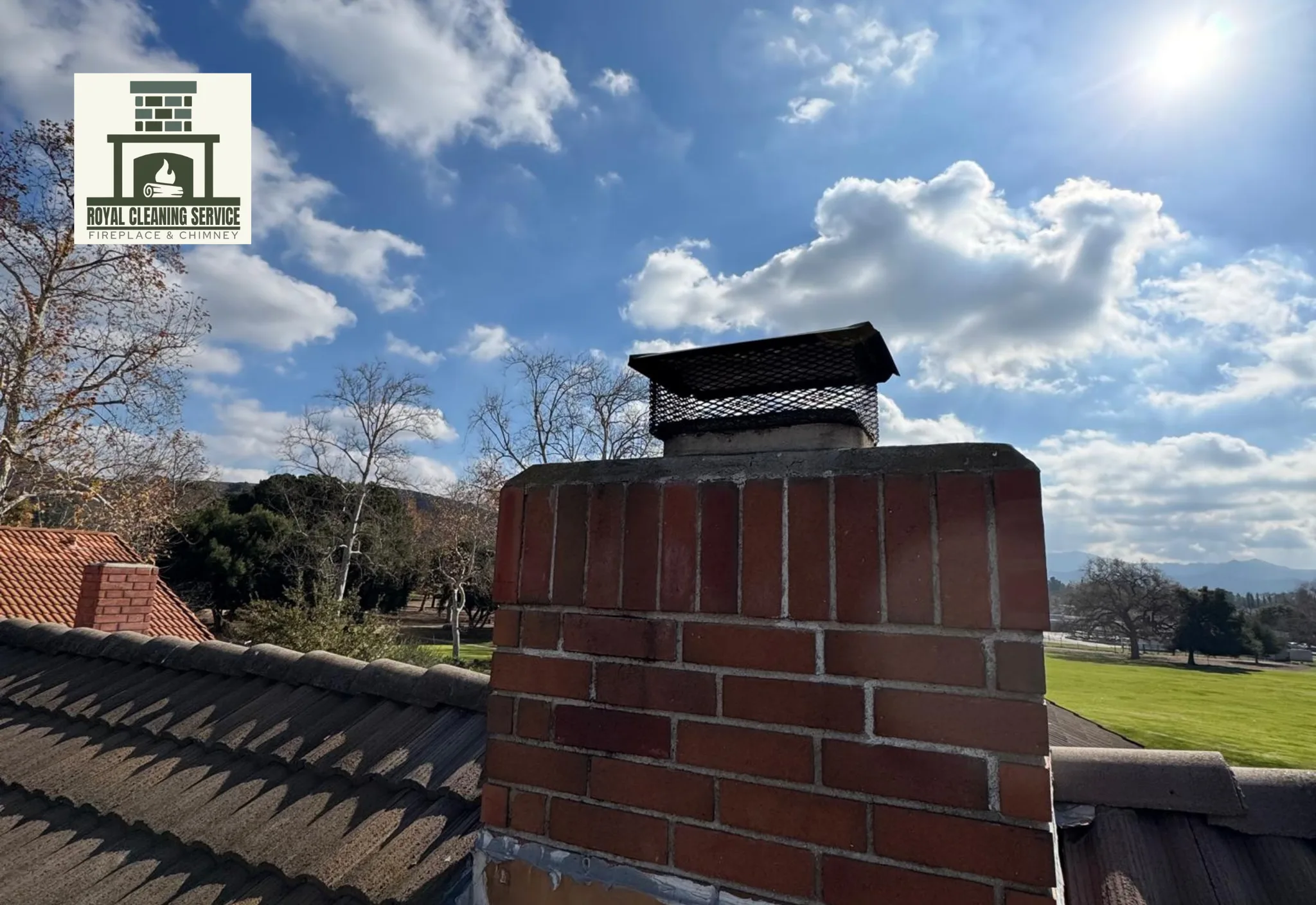 Royal Cleaning Service technician performing a Level 2 video camera chimney inspection in Los Angeles, reviewing flue interior footage
